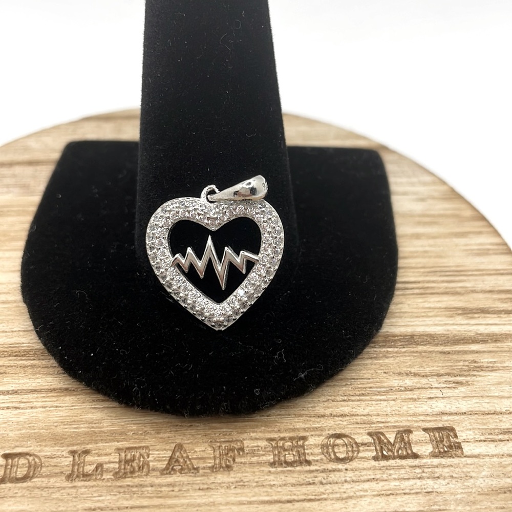 STERLING SILVER MICROPAVE CZ OPEN HEART WITH HEARTBEAT CENTER PENDANT
